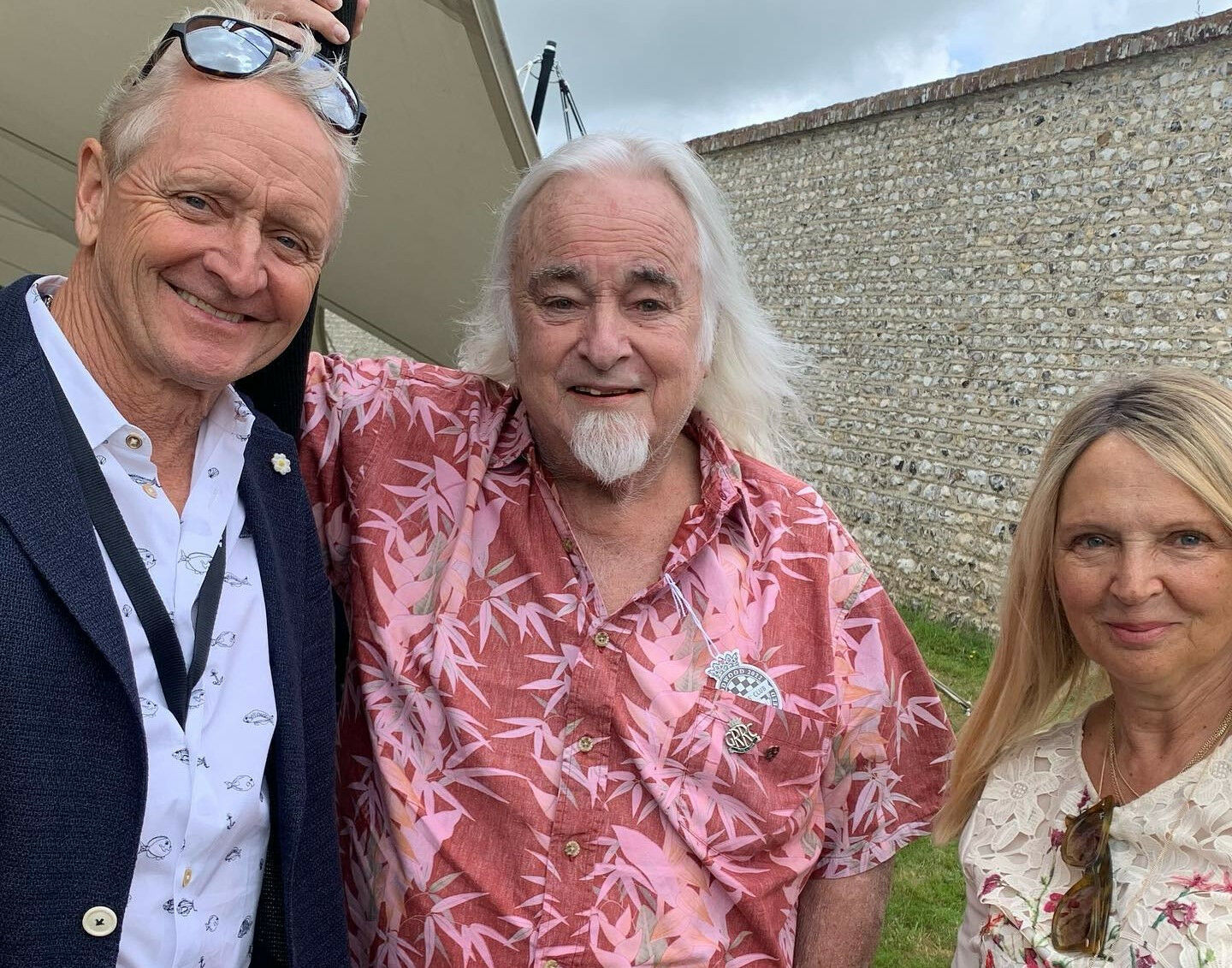 Kevin Schwantz (left) with Garry Taylor (center) and Garry's wife Kate (right) at the Goodwood Festival of Speed in 2022. Photo courtesy Kevin Schwantz.