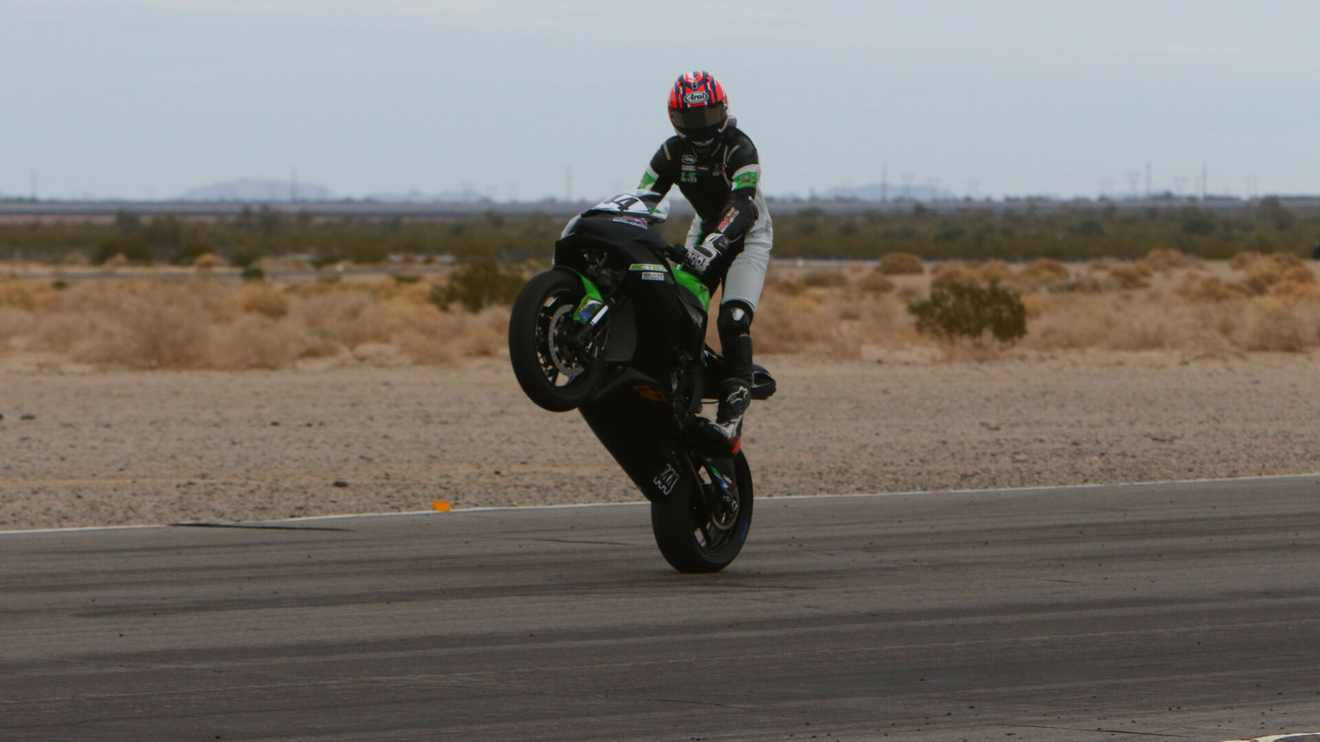 Brenden Ketelsen (144) celebrates one of his CVMA race wins at Chuckwalla Valley Raceway. Photo by Caliphotograhy.com, courtesy CVMA.