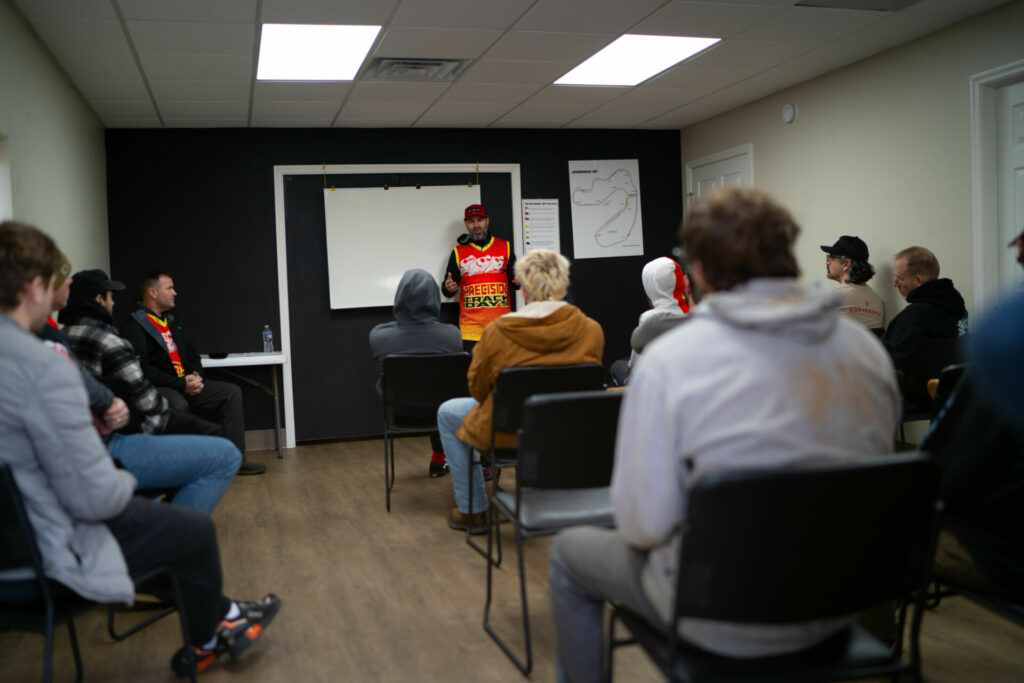 Precision Track Days Lead Instructor Julian Lopez offers instruction to a group of first-time Novice riders. Photo courtesy Precision Track Days.