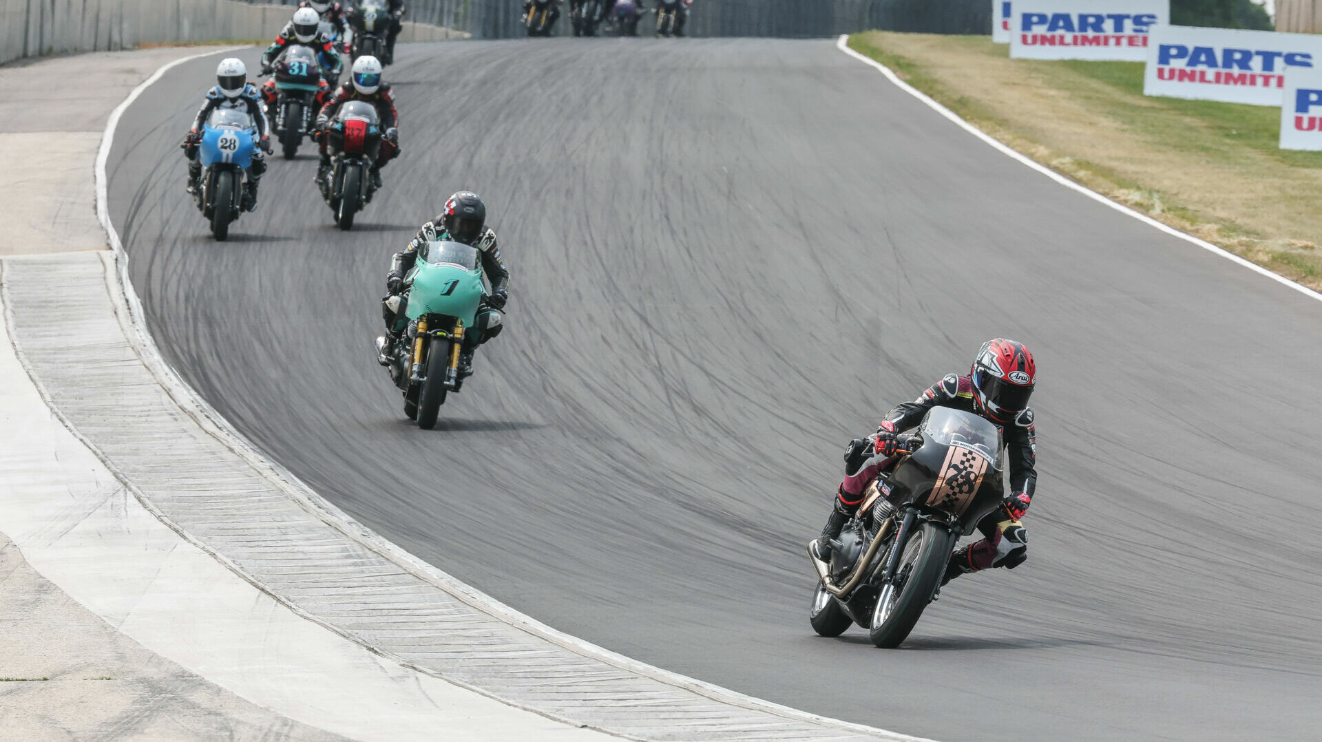 Action from a Royal Enfield Build. Train. Race. (BTR) road race at Road America in 2023 with eventual Champion Mikayla Moore (78) leading the way. Photo by Brian J. Nelson.