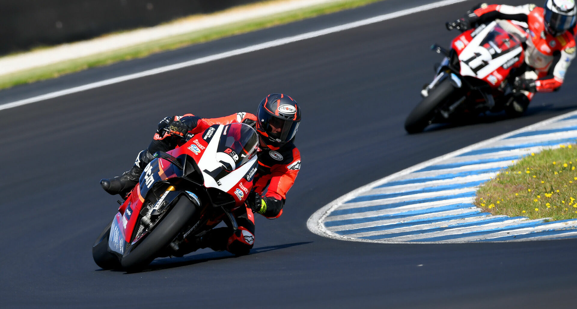 Troy Herfoss (1) at speed on his new DesmoSport Ducati Panigale V4 R. Photo by Russell Colvin, courtesy ASBK.