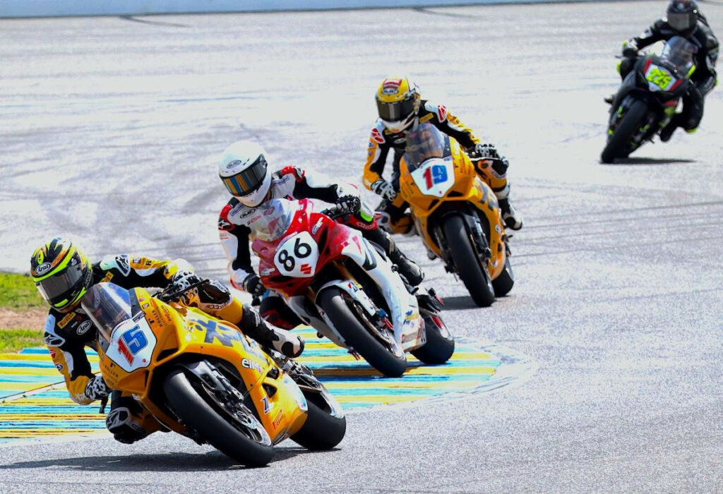 Hindle-sponsored Canadian Superbike Champion Ben Young is sandwiched in between Rahal Ducati Moto's PJ Jacobsen (15) and Kayla Yaakov (19) during the 2024 Daytona 200. Photo courtesy CSBK and Hindle.