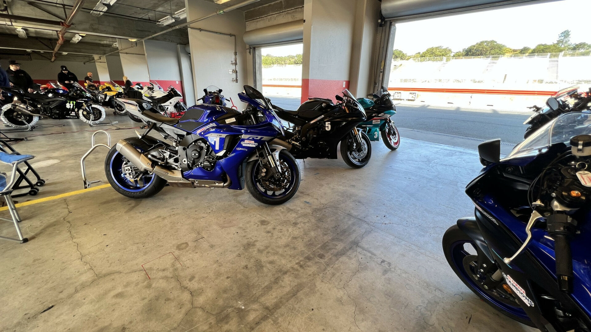 Motorcycles waiting to be ridden at a Yamaha Champions Riding School (YCRS) event in 2023. Photo courtesy YCRS.