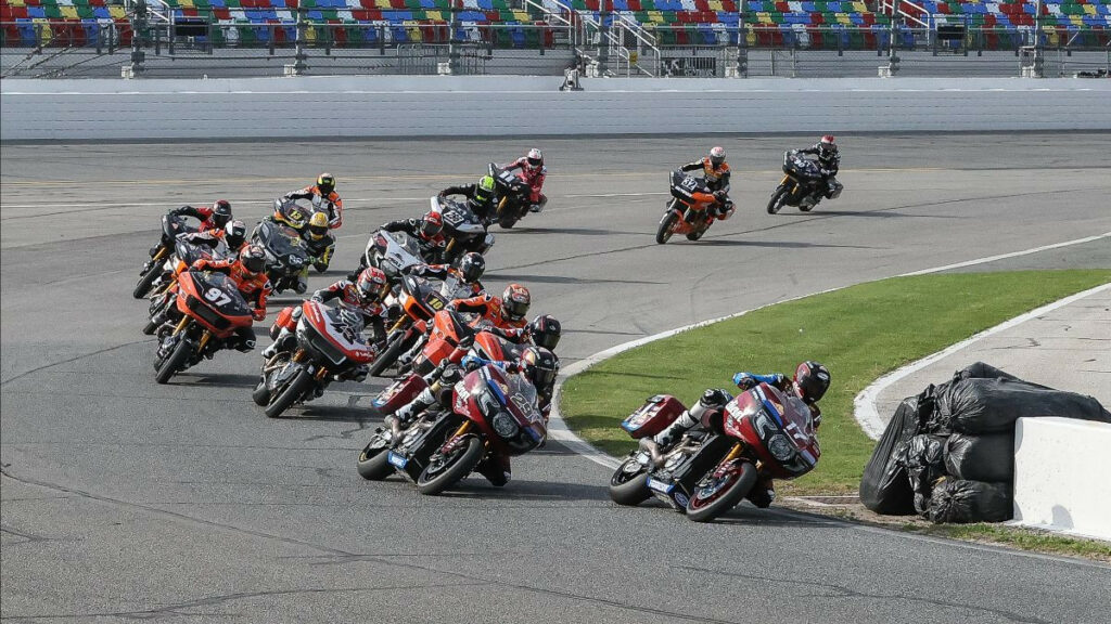 Troy Herfoss (17) leads Tyler O'Hara (29) into turn one at the start of the second Mission King Of The Baggers race at Daytona International Speedway. Photo by Brian J. Nelson, courtesy MotoAmerica.
