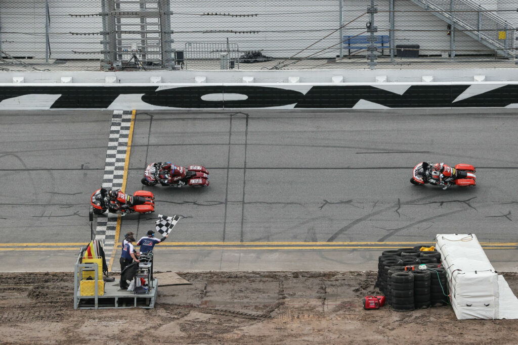 Kyle Wyman (33) won King Of The Baggers Race One over Troy Herfoss (17) and James Rispoli (43). Photo by Brian J. Nelson.