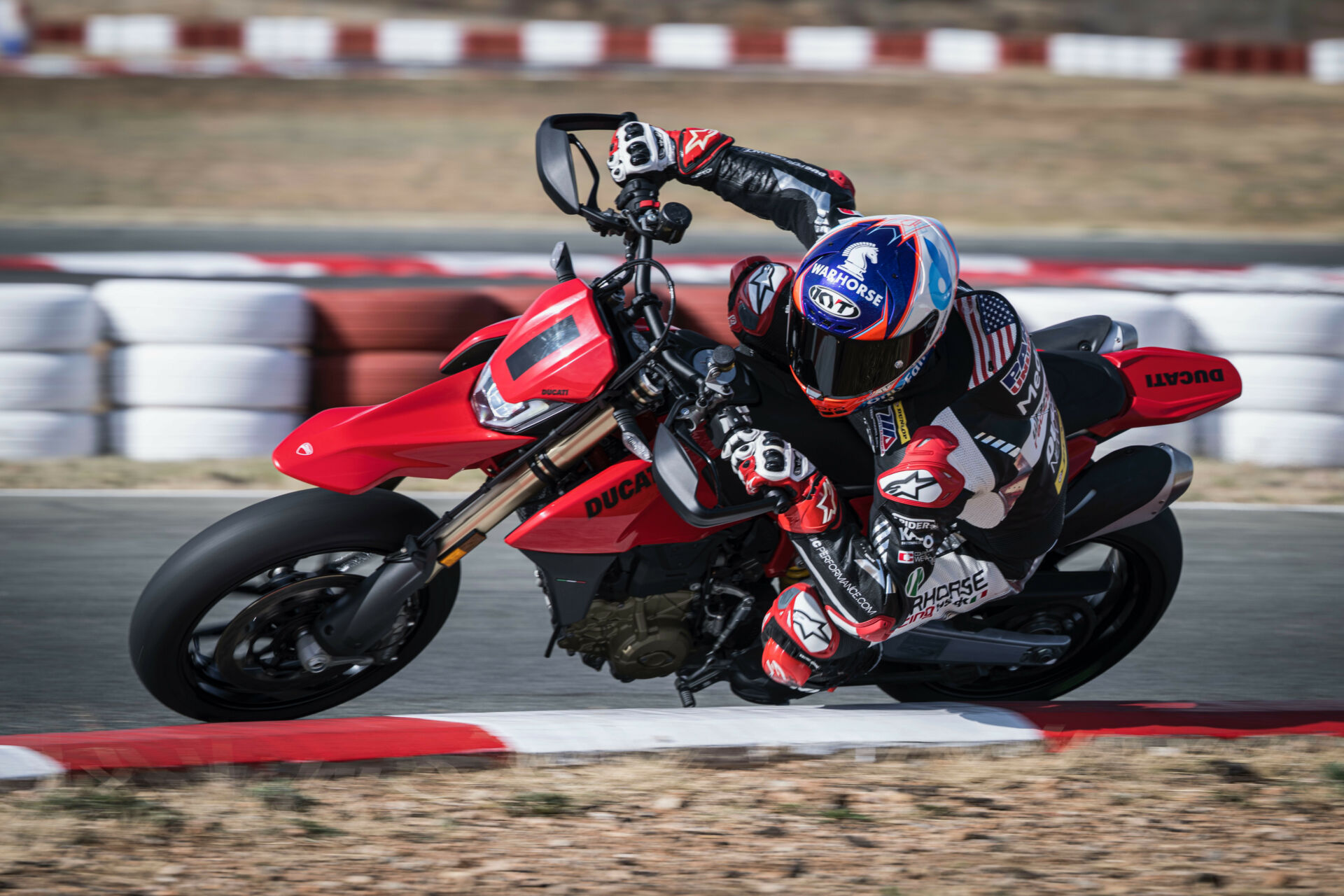 Josh Herrin wearing his custom painted KYT KX-1 Race helmet while testing a Ducati 698 Hypermotard. Photo courtesy Ducati and KYT Americas.