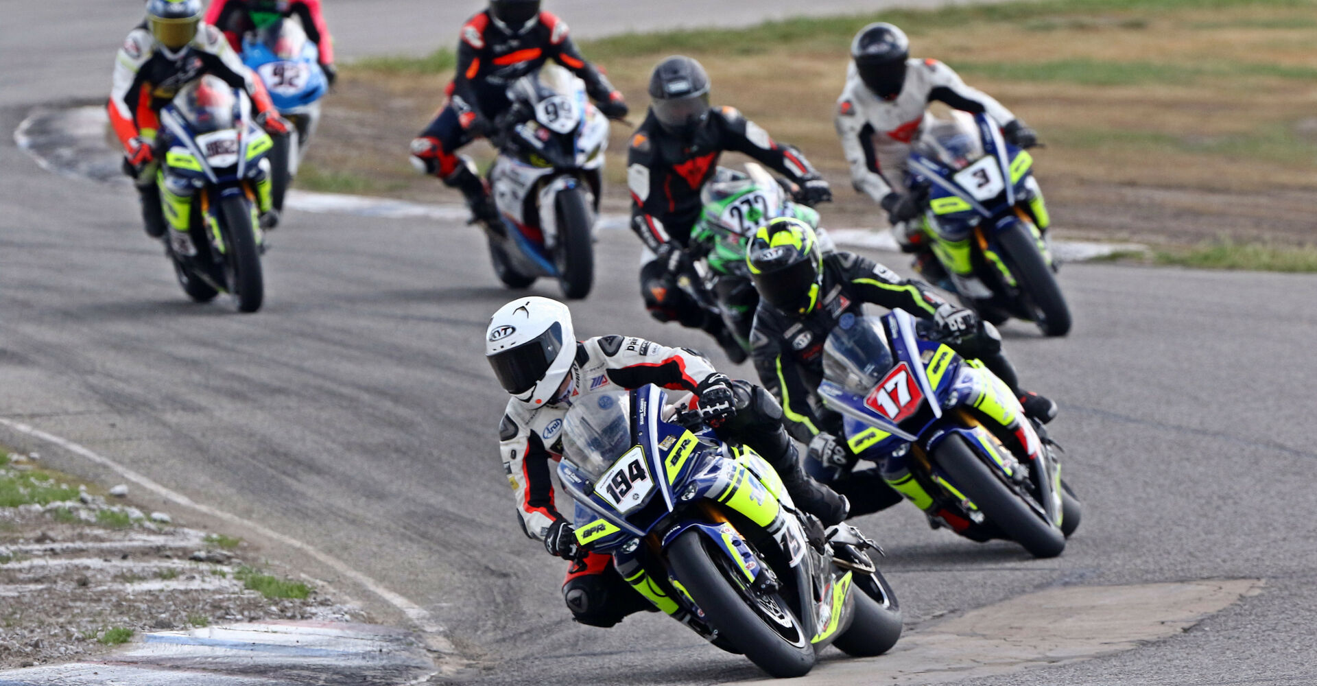 Deion Campbell (194) leads eventual winner Bryce Prince (74), Wristin Grigg (272), Ben Hodges (3), Sean Williams (99), Jason Rodriguez (882) and Joel Ohman (92) in the California Roadrace Association's featured Pacific Utility Gold Cup race at Buttonwillow Raceway Park. Photo by caliphotography.com, courtesy of California Roadrace Association.