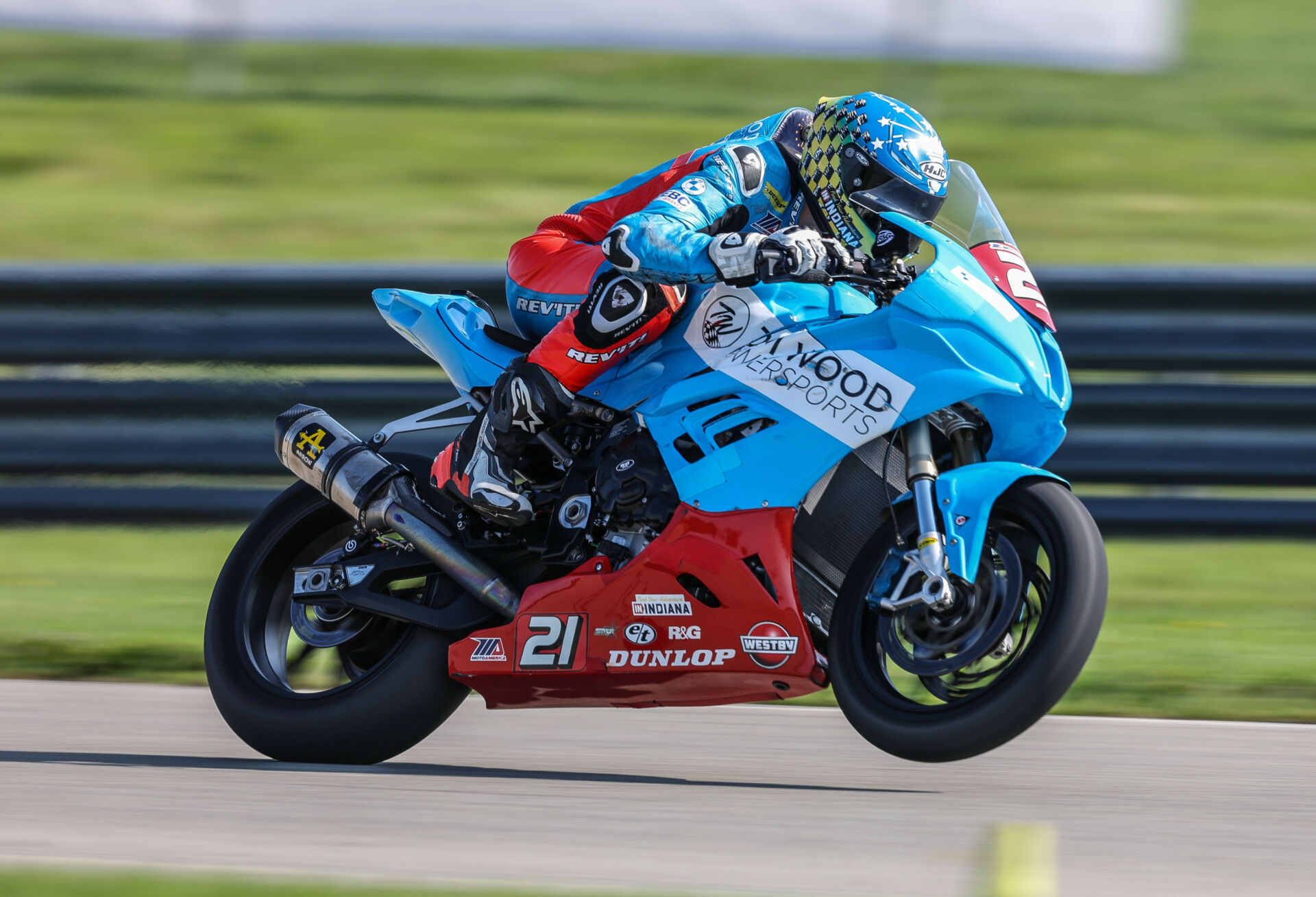 Nolan Lamkin (21) wearing his Visit Indiana helmet on his Tom Wood Powersports BMW in 2023. Photo by Brian J. Nelson.