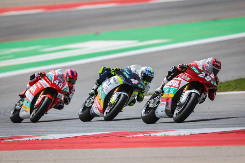 Nicholas Spinelli (29) leads Hector Garzo (4) and Mattia Casadei (40) in MotoE Race One. Photo courtesy Dorna.