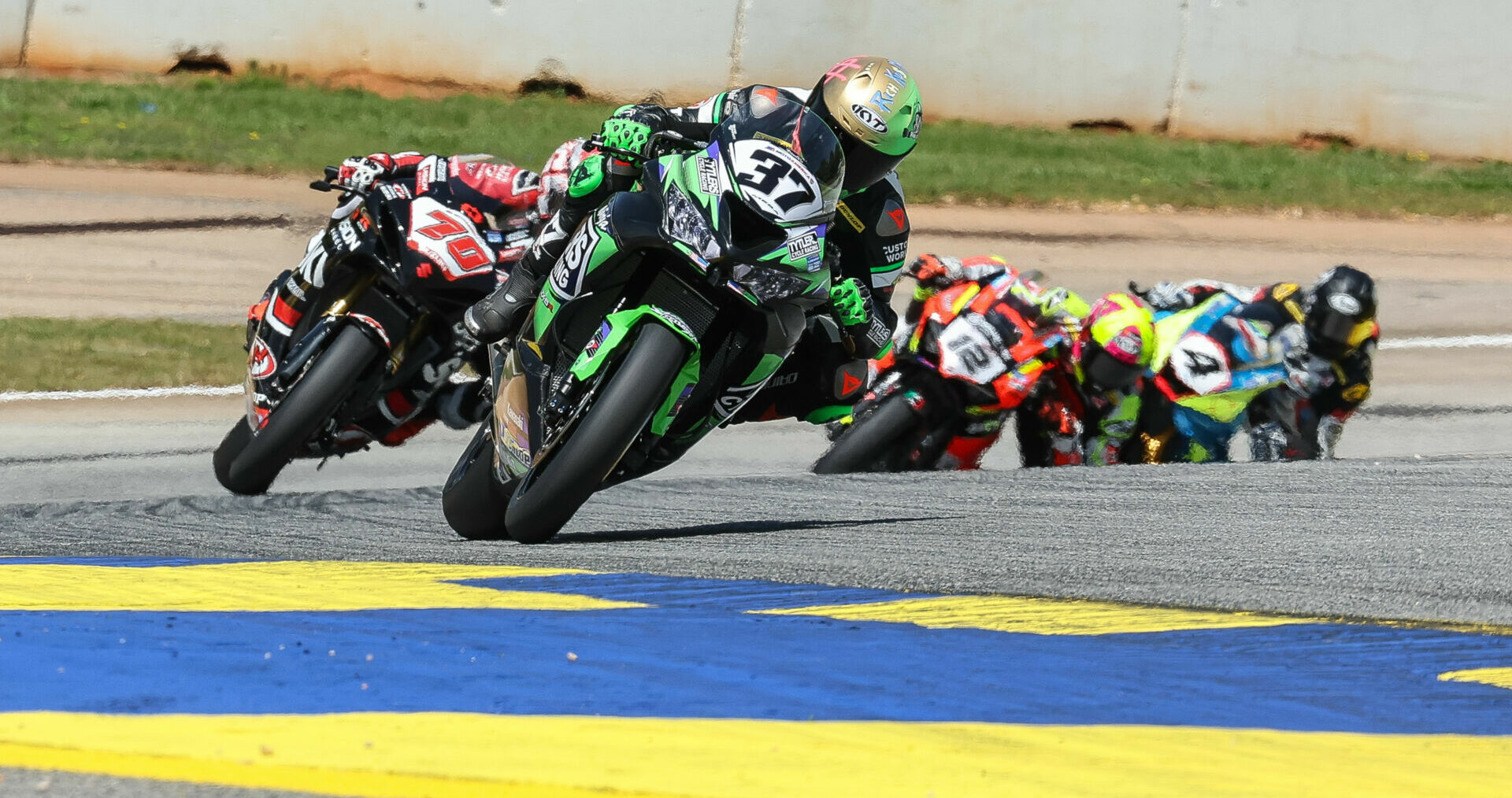 Stefano Mesa (37) leading Tyler Scott (70), Xavi Fores (12), and Josh Hayes (4) at Road Atlanta in 2023. Photo by Brian J. Nelson.