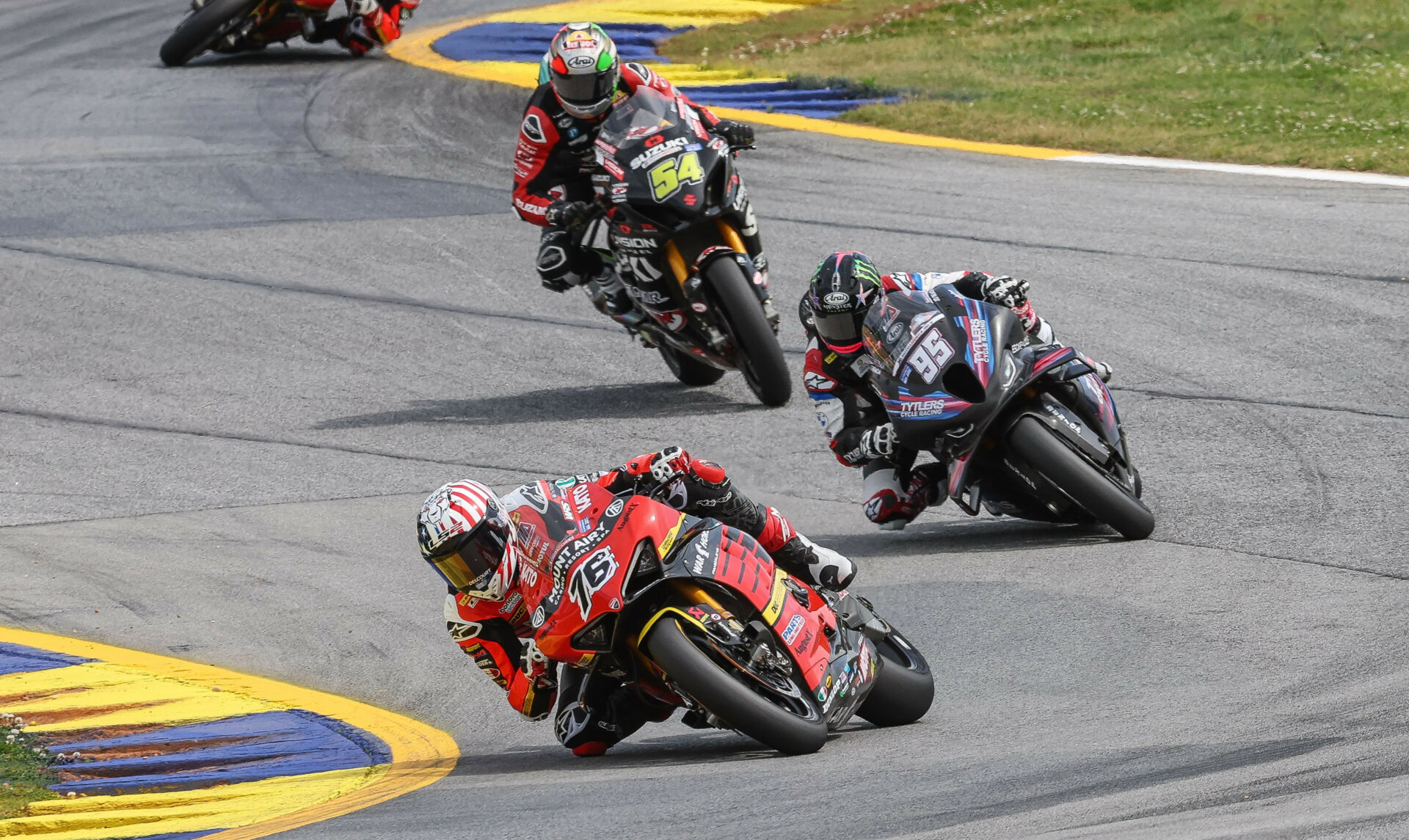 Loris Baz (76) leading JD Beach (95) and Richie Escalante (54) during MotoAmerica Superbike Race One at Road Atlanta. Photo by Brian J. Nelson.