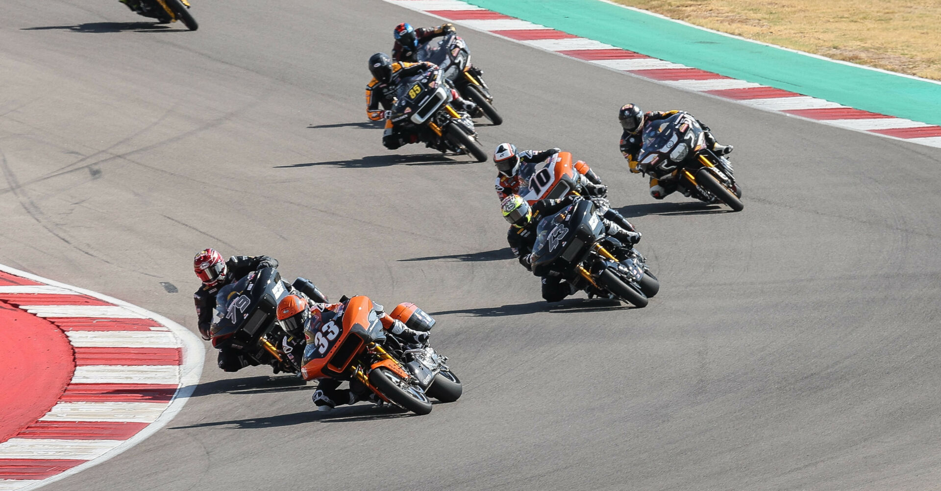 Kyle Wyman (33) leads Hayden Gillim (79), James Rispoli (43), Travis Wyman (10), Bobby Fong (50), and the rest of the King Of The Baggers field at COTA in 2023. Photo by Brian J. Nelson.