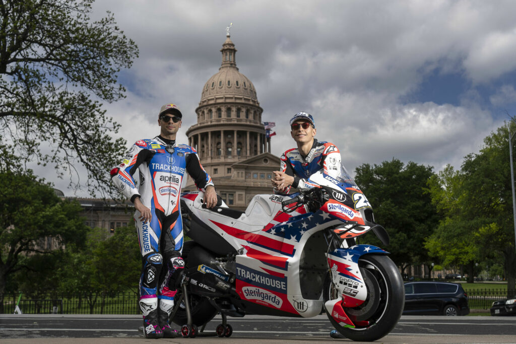 Miguel Oliveira (left) and Raul Fernandez (right) wiith a Trackhouse Racing Aprilia at the Texas State Capital building in Austin. Photo courtesy Dorna.