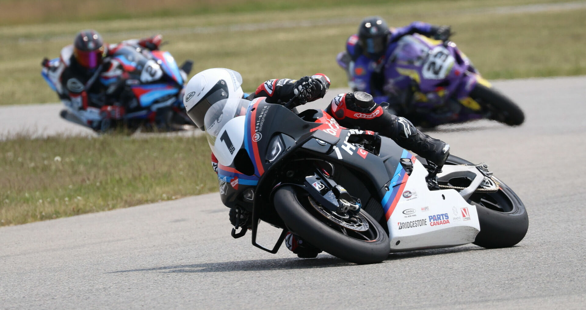 The only three Superbike riders to score a lap led bonus during the 2023 CSBK season - Ben Young (1), Alex Dumas (23), and Sam Guerin (2). Bridgestone CSBK have revised the points structure for 2024 with the removal of the two-point bonus for leading a lap during a race. Photo by Rob O'Brien, courtesy CSBK.