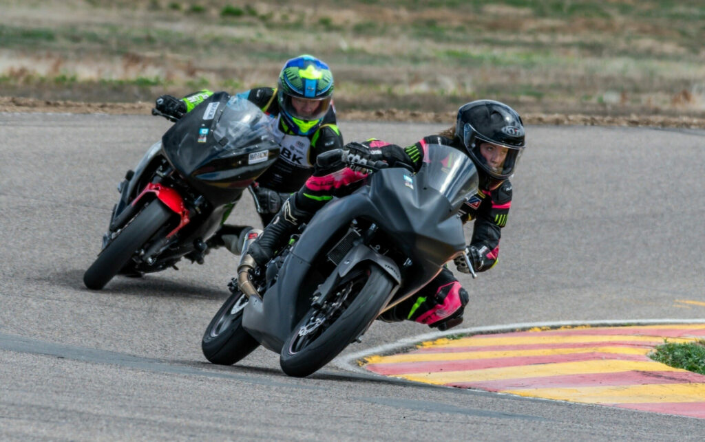 Samantha Parker, age 16, pushes her pace as she leads coach Dan Parker. Photo by Kelly Vernell, courtesy LegionSBK.