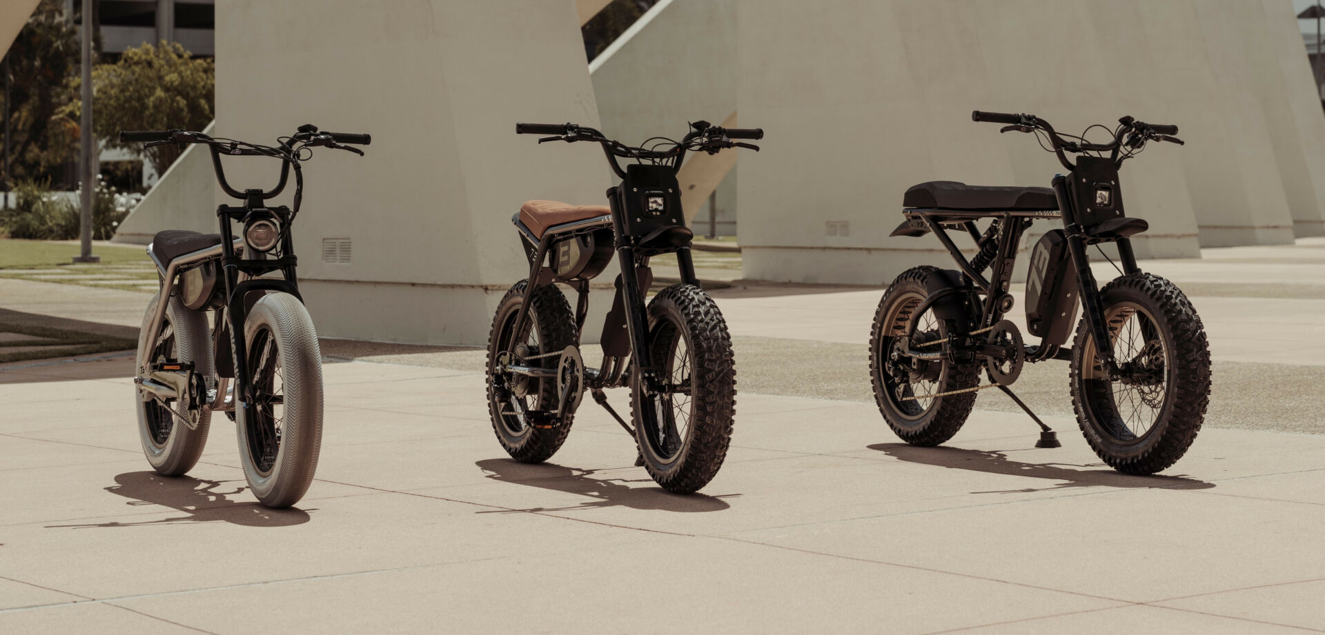 2024-model SUPER73 e-bikes (from left) a SUPER73-Z Miami Speedway LE, a SUPER73-R Adventure Palladium SE, and a SUPER73-R Adventure Sandstorm. Photo courtesy SUPER73.