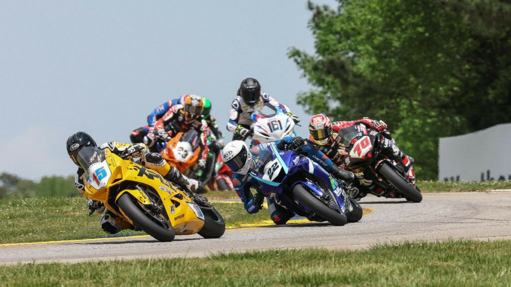 PJ Jacobsen (15) beat Blake Davis (22) to win the Supersport race on Saturday at Road Atlanta. Tyler Scott (70) crashed out of the lead. Photo by Brian J. Nelson.