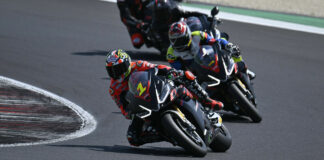 Six-time World Champion Max Biaggi (1) leading students at a previous Aprilia Pro Experience event. Photo courtesy Dorna.