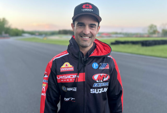 Xavi Forés walking the track at Mid-Ohio Sports Car Course on Sunday, prior to testing there on Monday.