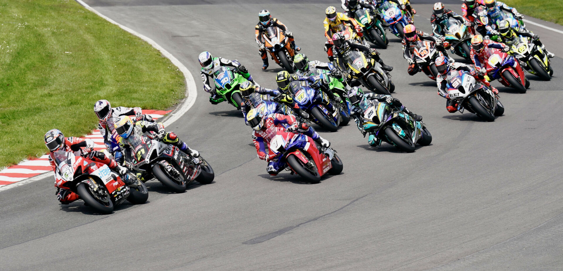 The start of a British Superbike race Monday at Oulton Park with Glenn Irwin (2) leading Christian Iddon (21), Tommy Bridewell (1) and the rest. Photo courtesy MSVR.