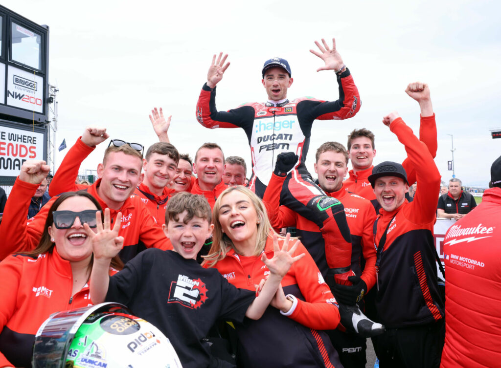 Glenn Irwin celebrates with his Hager PBM Ducati team. Photo courtesy NW200 Press Office.