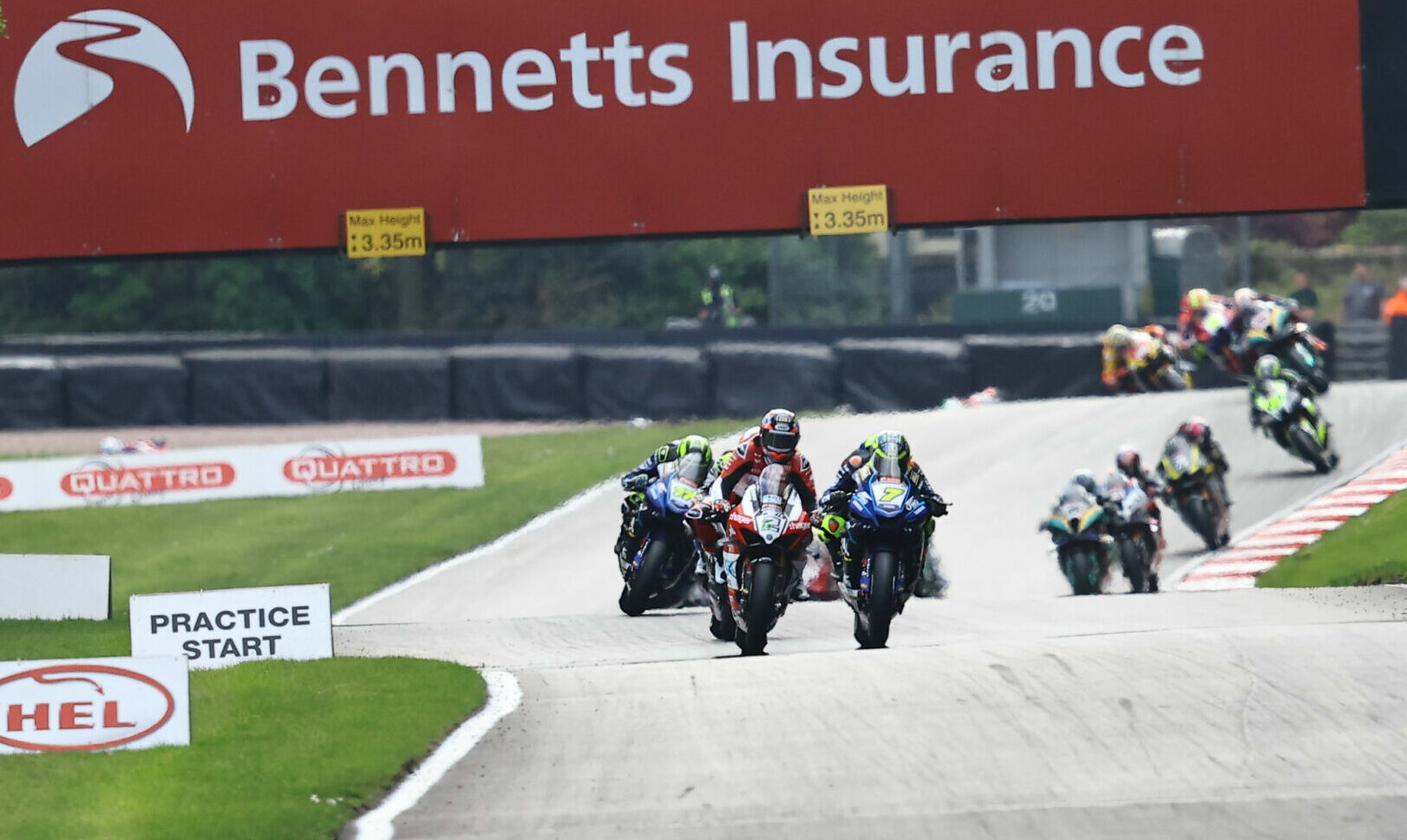 Glenn Irwin (2) leads Ryan Vickers (7) and the rest during British Superbike Race One Sunday at Oulton Park. Photo courtesy MSVR.