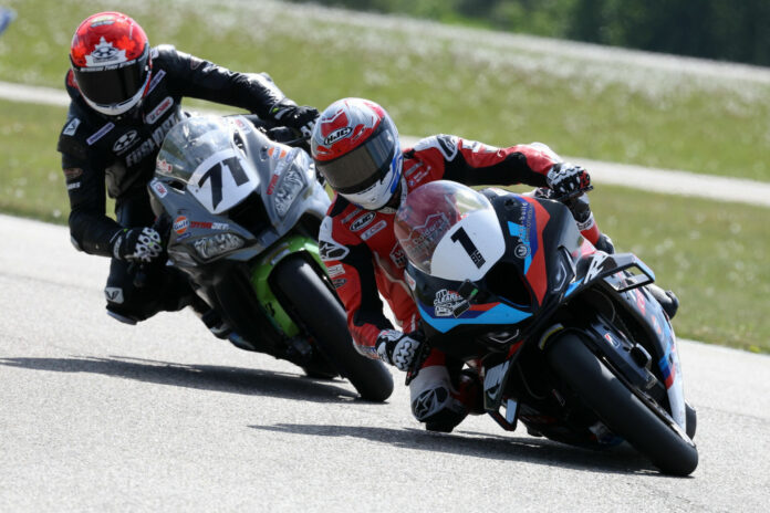 Last-lap Superbike action Saturday at RAD Torque Raceway saw Torin Collins (71) try multiple times to make a pass for the lead over victor Ben Young (1). Collins would finish second in his first CSBK race start. Photo by Rob O'Brien, courtesy CSBK.