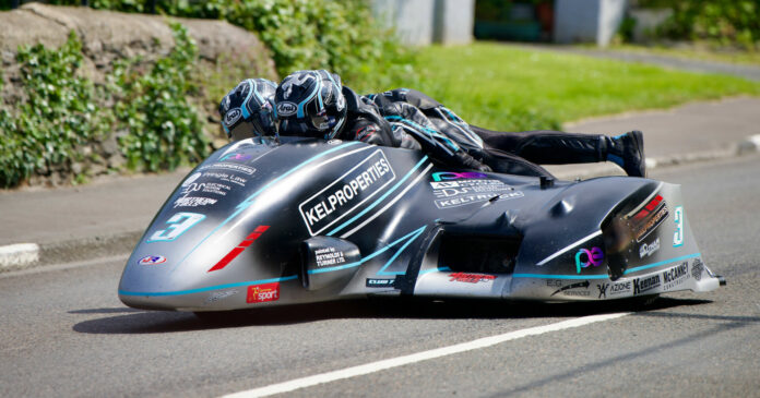 Brothers Ryan and Callum Crowe (3) won Sidecar TT Race Two. Photo by Barry Clay.