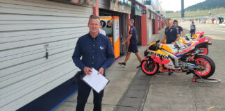 Simon Crafar, as seen in 2023 in his role as pit lane reporter for MotoGP's international broadcast. Photo courtesy Simon Crafar.