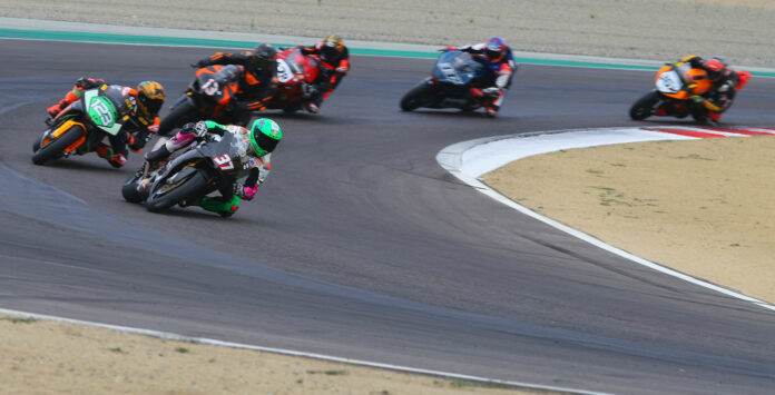 The start of the AHRMA Sound of Thunder 1 (SOT1) race on Sunday with Stefano Mesa (37) leading Troy Siahaan (123), Steve Metz (13X), Thomas Montano (42R), Rennie Scaysbrook (33X), and Jayson Uribe (36X). Photo by Etechphoto.com, courtesy AHRMA.