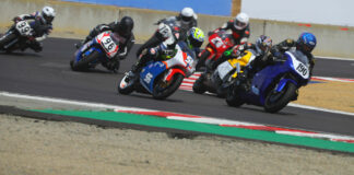 Action from the Open Two-Stroke race at the AHRMA Classic MotoFest™ of Monterey in 2023 with Rick Delgado (190) leading Stephen Gillen (56), David Dold (96), Jonathan Schendel (99), Ed Sorbo (78E), Darrell Baker (256), and the rest at WeatherTech Raceway Laguna Seca. Photo by etechphoto.com, courtesy AHRMA.