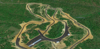 An aerial view of Ozarks International Raceway in its early days. The long building in the interior is a 58-day garage, and the paved area around it now connects the inner and outer sections, serving as a paddock for both. The track runs in a clockwise direction. Photo courtesy ASRA and Evolve GT.