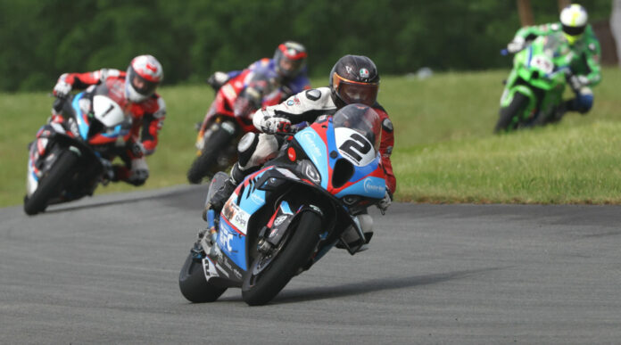 Saturday's Pro Superbike race at Atlantic Motorsport Park started on a wet, but drying, track with Sam Guerin (2) taking his second win of the season after a gamble on tire choice paid off. Photo by Rob O'Brien, courtesy CSBK.