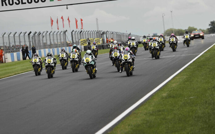 Maria Herrera (6) leads the start of WorldWCR Race Two at Donington Park. Photo courtesy Dorna.