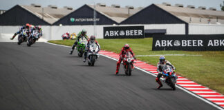 Toprak Razgatlioglu (54) leads Nicolo Bulega (11), Scott Redding (45), Alex Lowes (22), and the rest at Donington Park. Photo courtesy Dorna.