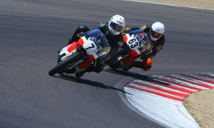 Dave Roper (7) and Walt Fulton (63) at speed at WeatherTech Raceway Laguna Seca. Photo by etechphoto.com, courtesy AHRMA.