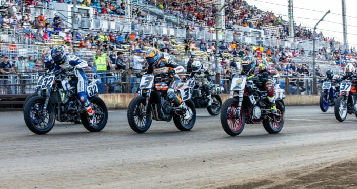 Dallas Daniels (32) leads Davis Fisher (behind Daniels), Briar Bauman (3), Jared Mees (1), and the rest of the AFT Mission SuperTwins field off the line at Springfield in 2023. Photo by Tim Lester.