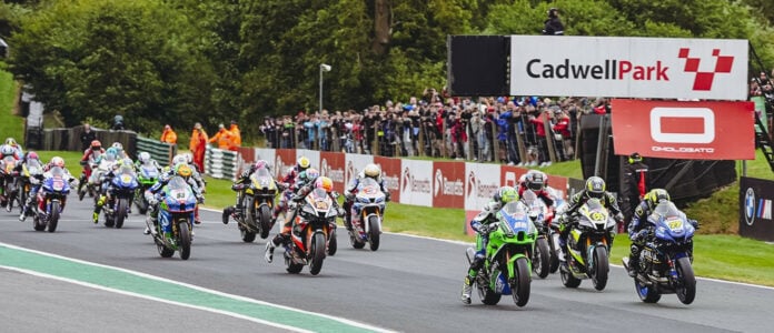 Kyle Ryde (77) and Jason O'Halloran (22) lead the field off the start of Race One Sunday at Cadwell Park. Photo courtesy MSVR.