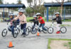 Kindergarten students taking part in the All Kids Bike program with Strider balance bikes. Photo courtesy All Kids Bike.