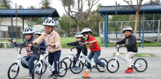 Kindergarten students taking part in the All Kids Bike program with Strider balance bikes. Photo courtesy All Kids Bike.