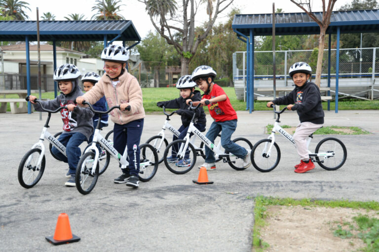 Kindergarten students taking part in the All Kids Bike program with Strider balance bikes. Photo courtesy All Kids Bike.