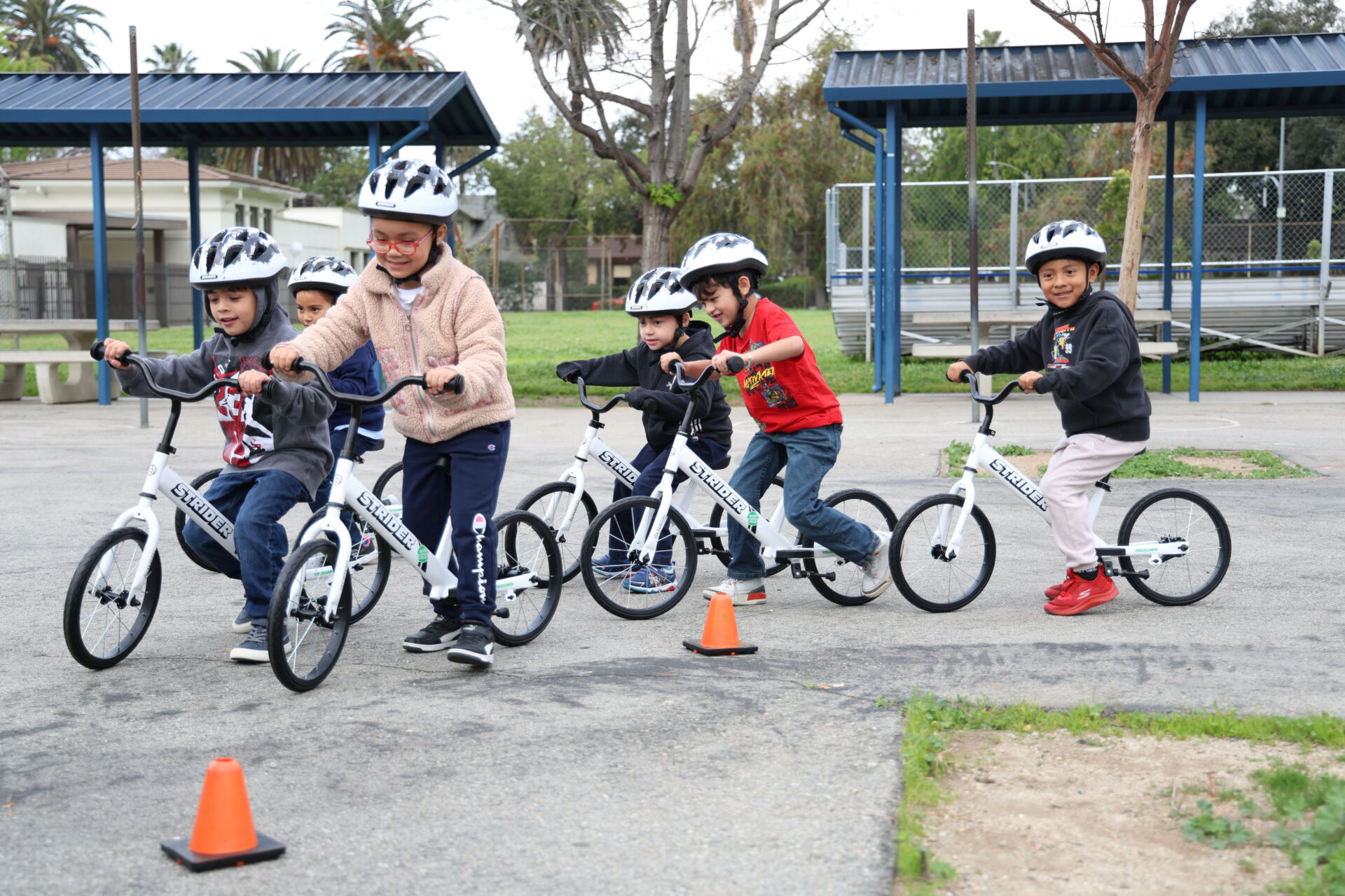 Kindergarten students taking part in the All Kids Bike program with Strider balance bikes. Photo courtesy All Kids Bike.
