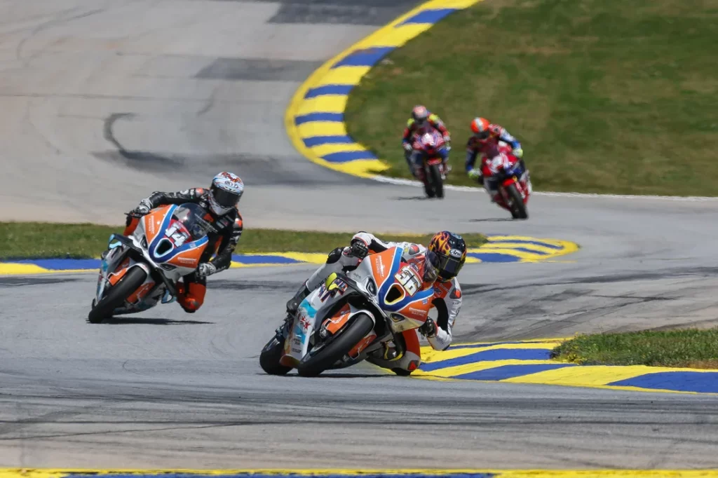 Jayson Uribe (36) turned the table on his teammate Andrew Lee (14) in the Stock 1000 class at Road Atlanta. Photo by Brian J. Nelson
