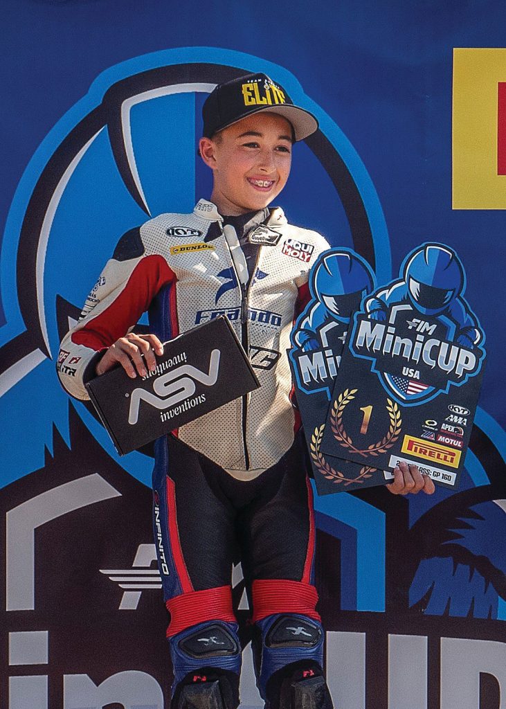 Jase Dill on the podium at Apex Racing Center. Photo by Karen E. Ott Photography.