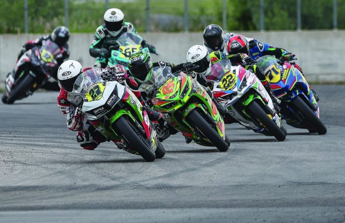 Woodworth action: Isaac Woodworth (27) leading a MotoAmerica Junior Cup race at Brainerd in 2024. Photo by Brian J. Nelson.