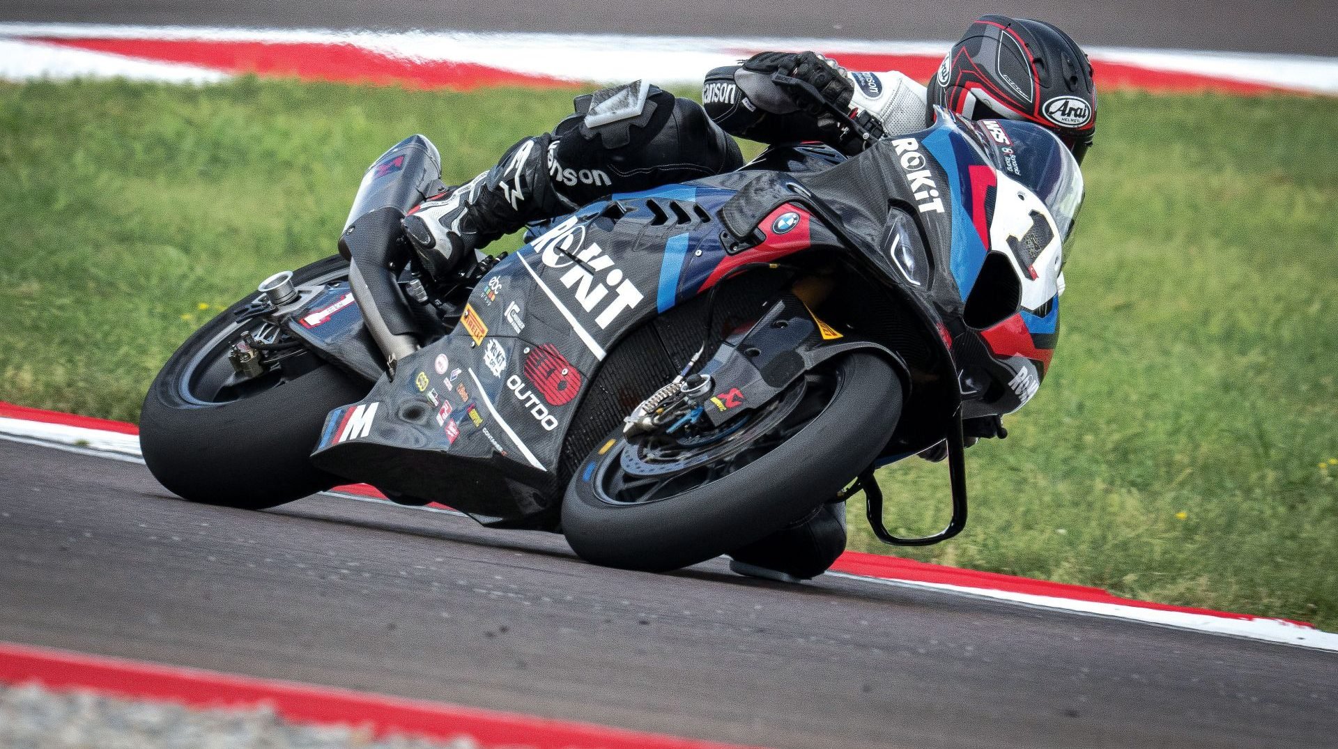 Sam Fleming on Toprak’s World Superbike. Note the cups on the axles for the quick change wheels to enable the team to leave the tires in the warmer ovens until the last possible second before the bike goes onto the track, the finned front calipers with dry-break lines, and lots and lots of radiator.