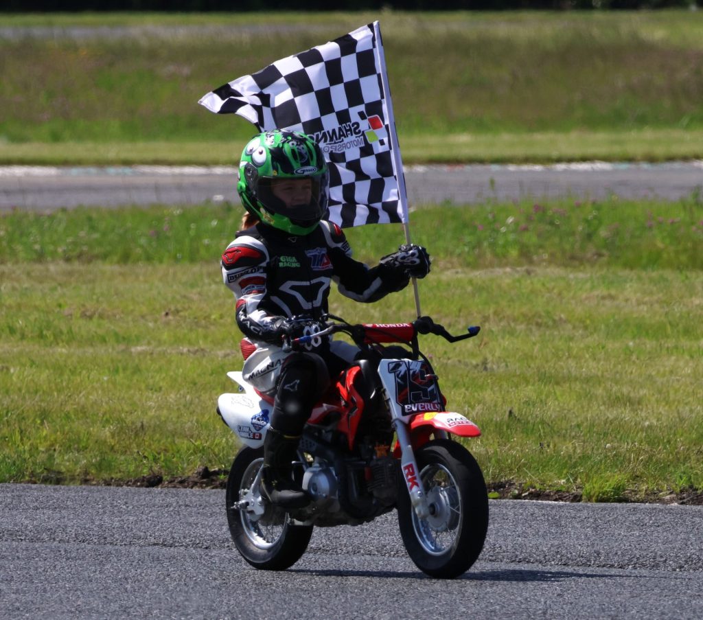 Shannonville MiniSBK Moto4 and Stock 50 class winner Everly Landry, age 8, on her Honda.