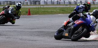 Shannonville Sprint Cup lap one during Sunday’s second RACE Moto Regional round and Elie Daccache holds first on the No. 1 Milwaukee Tools Yamaha from the No. 74 Royal Distributing BMW of Michael Leon and the No. 98 BMW of Matt Vanderhorst.