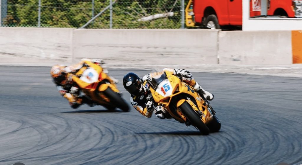 PJ Jacobsen (15) and Kayla Yaakov (19) on their XPEL Ducati Panigale V2 at Road America.