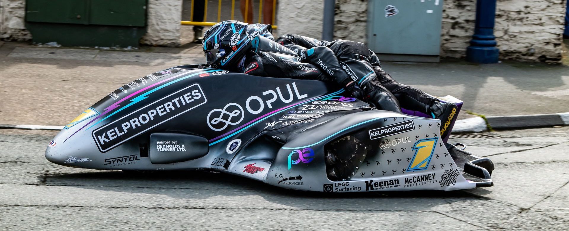 Ryan and Callum Crowe claimed a commanding win in Sidecar TT Race 2. Photo Barry Clay.